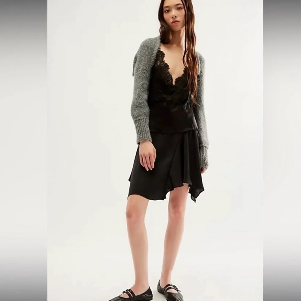 Free People size 6 Slim Shine black asymmetrical silky feel mid-rise short skirt